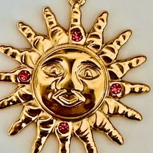 Gold Sunburst Pendant with Pink Crystal Accents